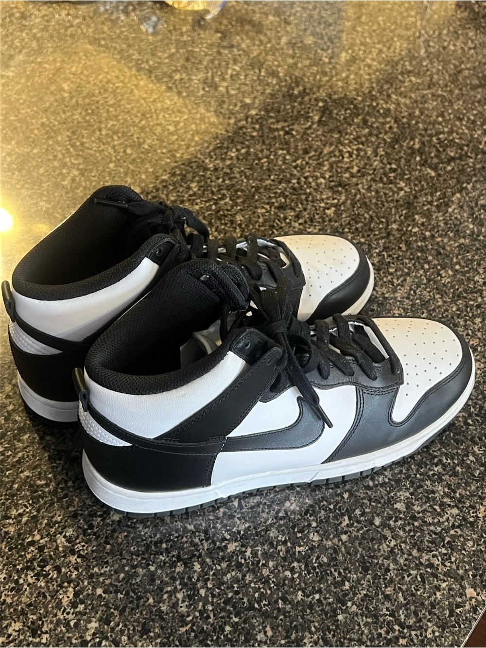 Women Nike Black and White High-Top Sneakers